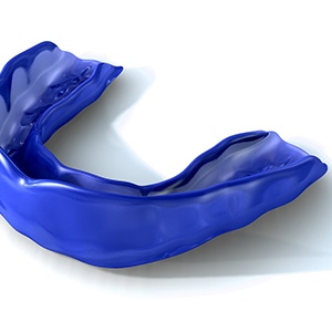 Close-up of a blue mouthguard on a white background