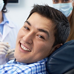 man in plaid smiling