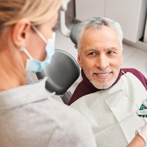 An older man getting dental impressions for dentures