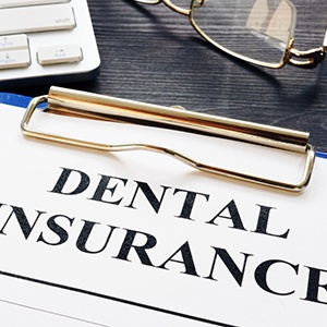 dental insurance form on table