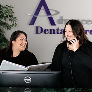 mother and daughter at front desk