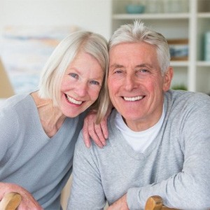 patients smiling while enjoying the benefits of dental implants in Costa Mesa