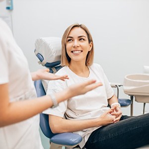 woman at a consultation with her implant dentist in Costa Mesa