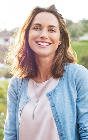 woman smiling in sunlight
