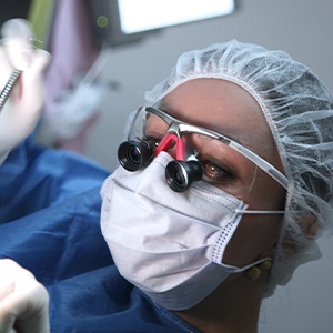 dentist doing osseous surgery