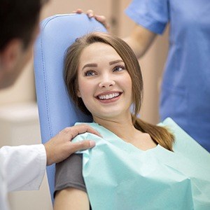 teen girl smiling at dentist