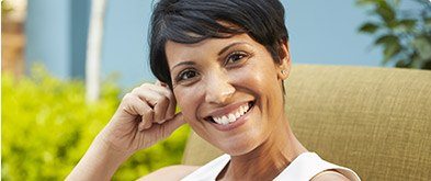 woman sitting outside in chair