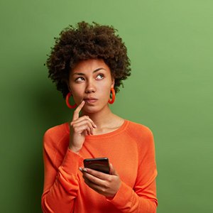 Lady reads something on phone
