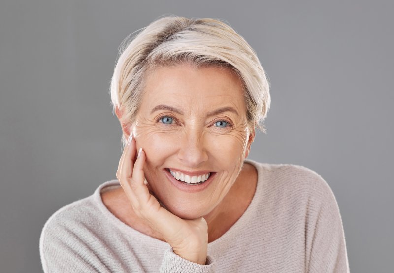 older woman with brighter dentures