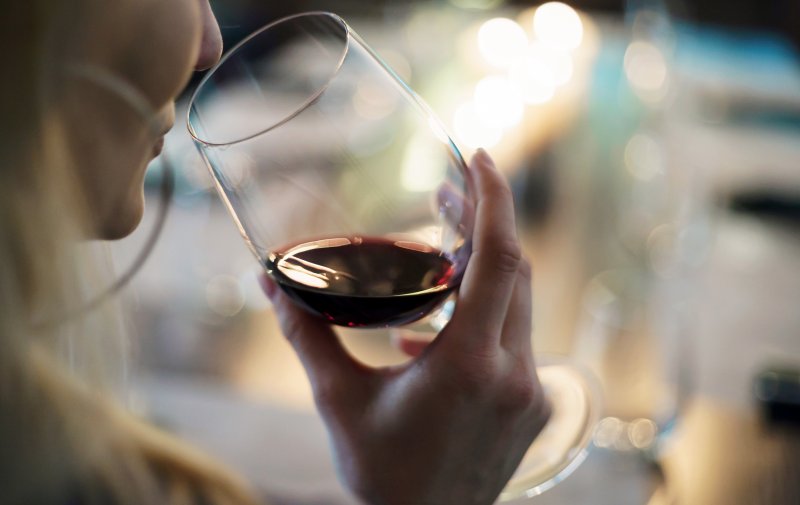 Woman drinking red wine