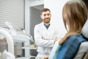 Woman visiting the dentist for a dental bone graft consultation.