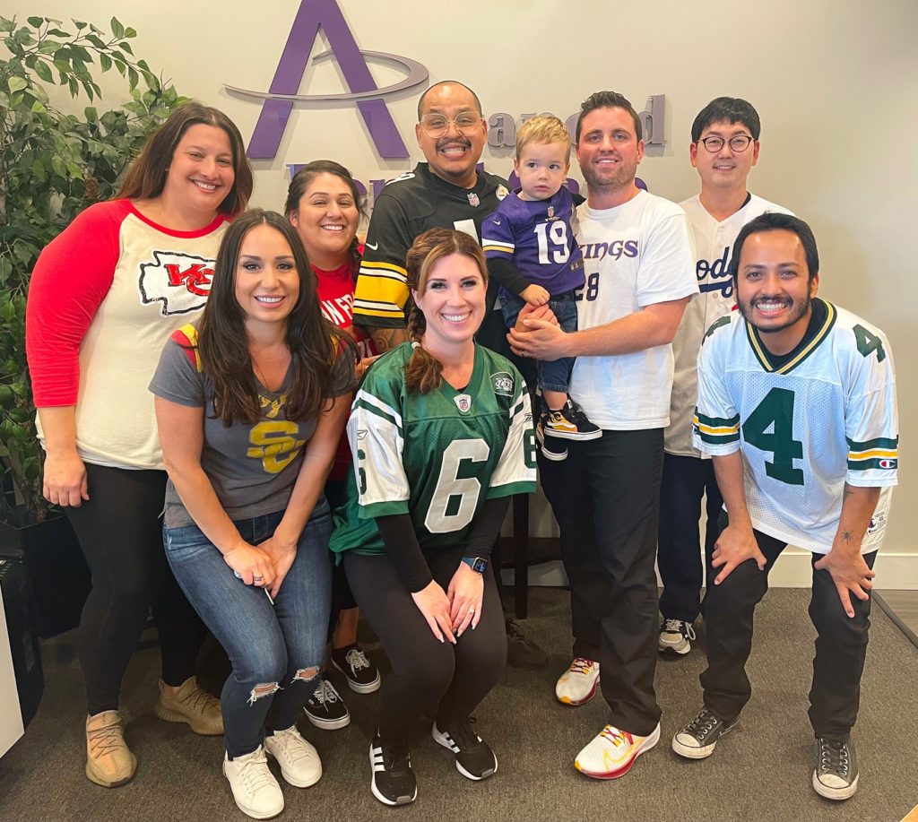 Football jersey day at Advanced Dental Care in Costa Mesa, CA